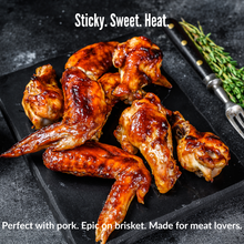 Load image into Gallery viewer, Sticky glazed chicken wings with garlic, chilli, and K-Pow Spicy Plum sauce. Perfect meat pairing for backyard BBQ or smoky grills.